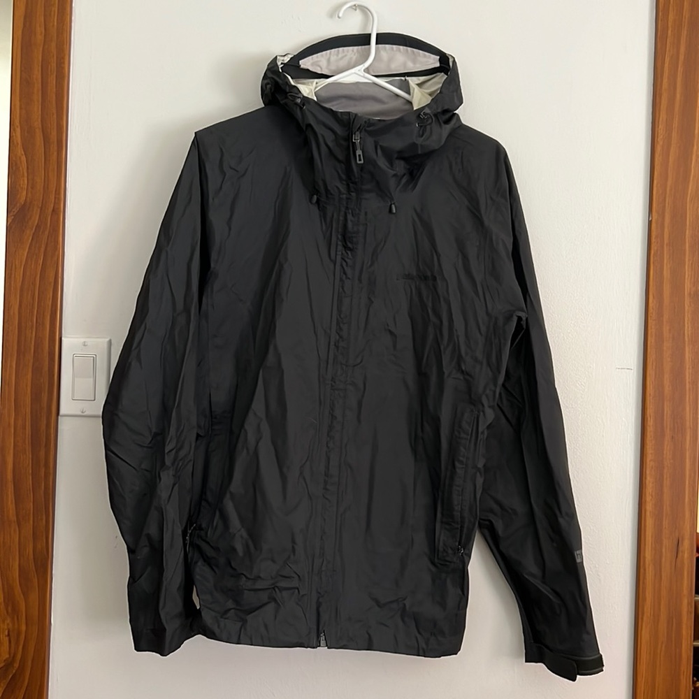 Patagonia Torrentshell dark gray.